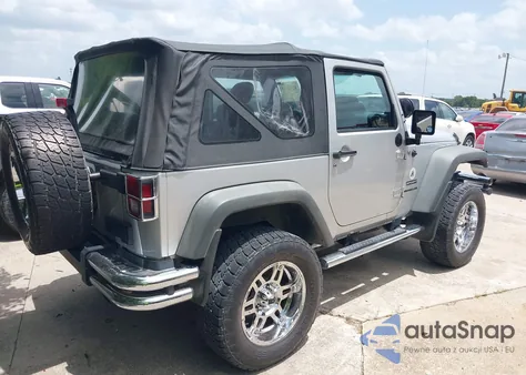 2011 Jeep Wrangler Sport z USA, uszkodzony, nr VIN 1J4AA2D17BL541428